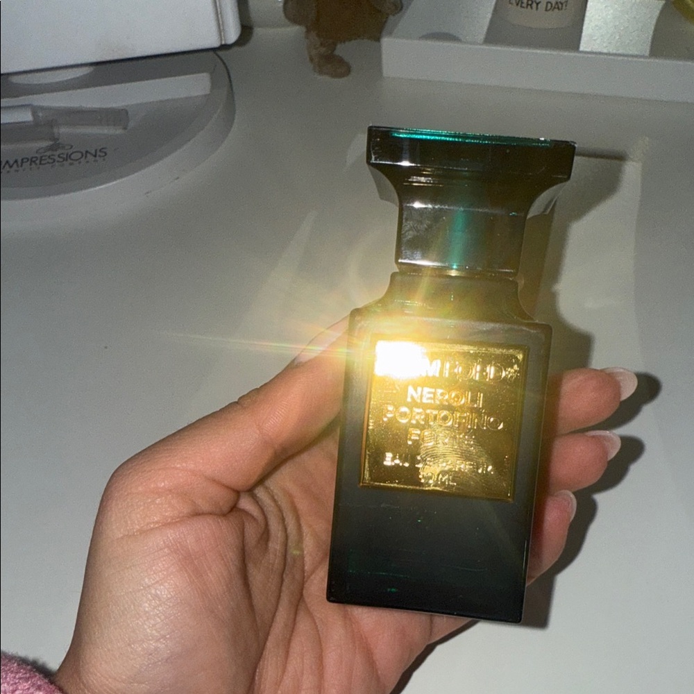 Tom Ford Black and Gold Fragrance Bottle